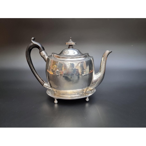 300 - A George III silver teapot and matching stand, London 1805, 526g.