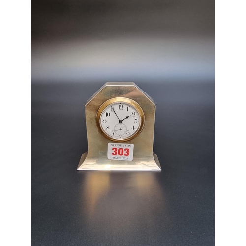 303 - A silver mantel clock, marks rubbed, 10cm high.