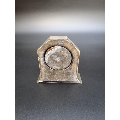 303 - A silver mantel clock, marks rubbed, 10cm high.