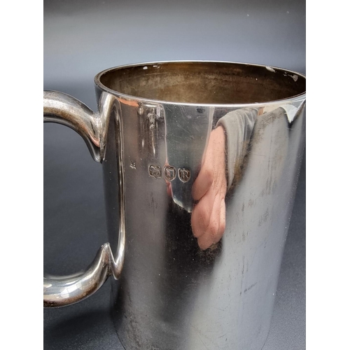 313 - A Victorian silver beer tankard, by William Hutton & Sons, London 1892, 12cm high, 268g.... 