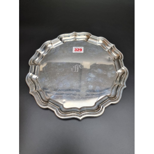 329 - An American white metal Chippendale style salver by Reed & Barton, stamped 'Sterling, X364', 25.... 