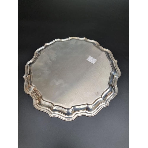 329 - An American white metal Chippendale style salver by Reed & Barton, stamped 'Sterling, X364', 25.... 