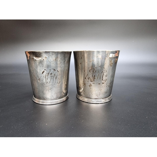 335 - A pair of George III silver beakers, by Thomas Chawner London 1786, engraved initials, 8cm high, the... 