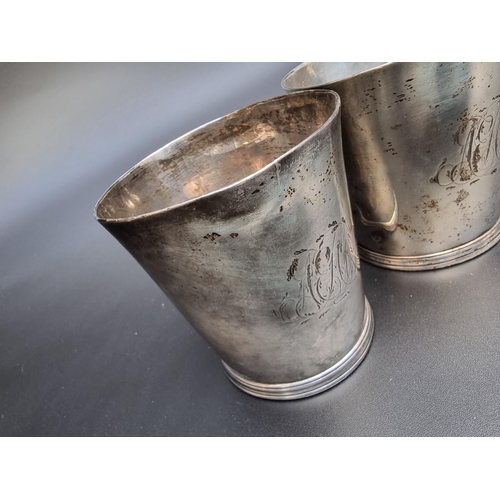 335 - A pair of George III silver beakers, by Thomas Chawner London 1786, engraved initials, 8cm high, the... 