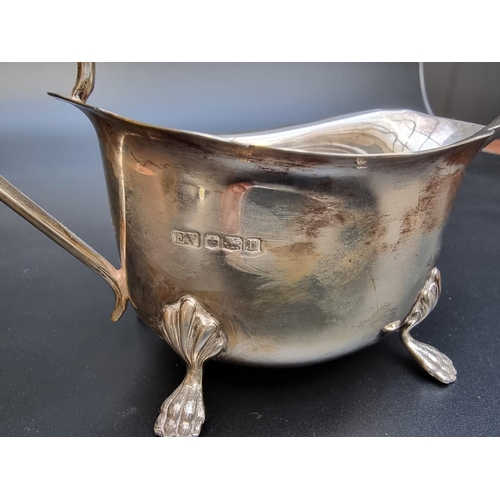 340 - A silver three piece tea set, by Viners, Sheffield 1930, gross weight 1122g.