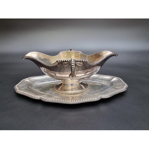 350 - A Danish white metal sauce tureen, stamped A D, assayer Christian F. Heise, 1904-32, 25cm, 527g.... 