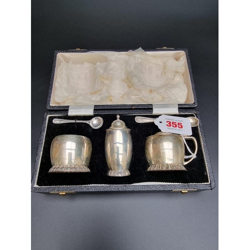 355 - A cased silver cruet set by Garrard & Co, Sheffield 1964, 190g.