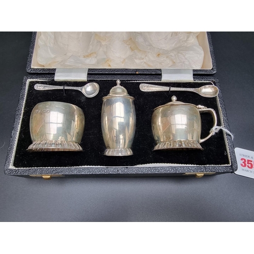 355 - A cased silver cruet set by Garrard & Co, Sheffield 1964, 190g.