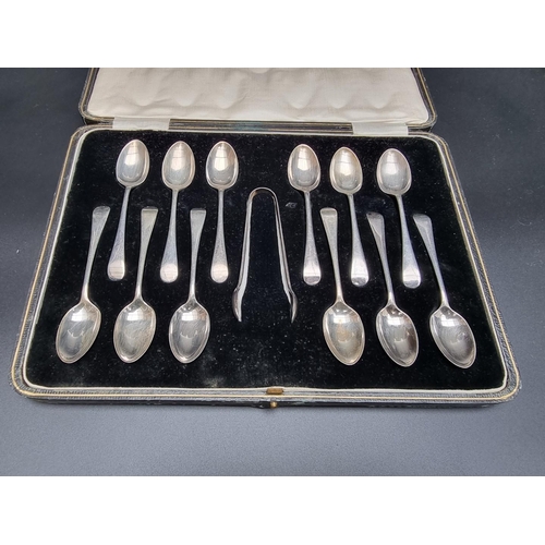 366 - A cased set of twelve Old English pattern silver coffee spoons and matching tongs, by Cooper Brother... 