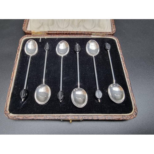 368 - A cased set of six silver bean handled coffee spoons, by William Suckling Ltd, Birmingham 1924, 36g.... 