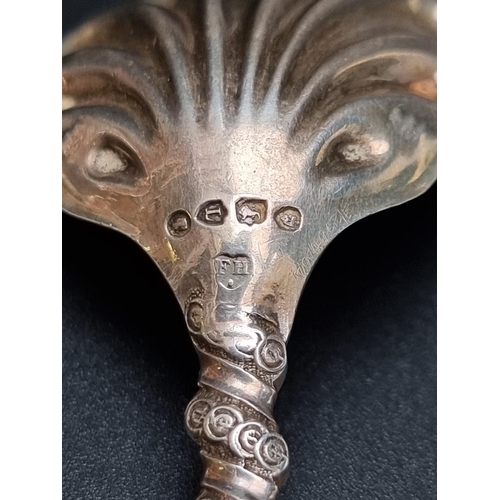 392 - A Victorian silver shell caddy spoon, by Francis Higgins, London 1886, 25g.