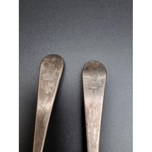 396 - A pair of provincial silver Old English pattern dessert spoons, makers mark only I C, possibly John ... 