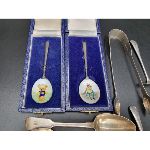 397 - A small quantity of silver cutlery, to include two cased silver and enamel child' spoons, gross weig... 