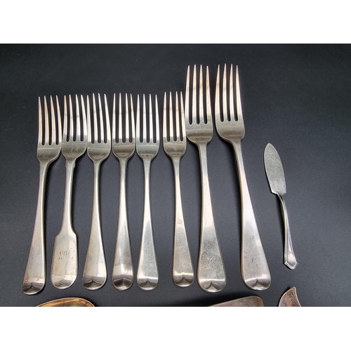 401 - A quantity of Georgian and Victorian silver cutlery, different dates and makers, 545g; together with... 