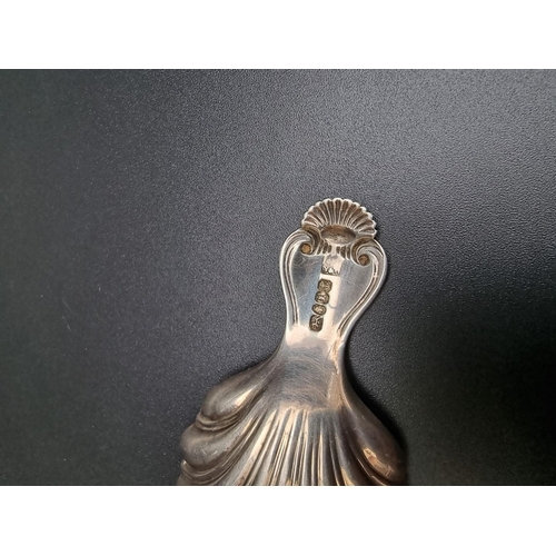 406 - A Victorian silver shell caddy spoon, by Yapp & Woodward, Birmingham 1846, 16.4g.... 