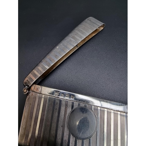 421 - An engine turned silver card case, by William Neale & Son Ltd, Birmingham 1931, 81mm, 41g.... 