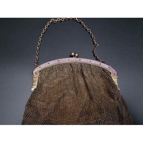 437 - A Continental white metal mesh evening bag, having coloured enamel decoration, stamped 'Sterling Sil... 