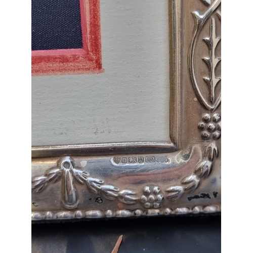 473 - A pair of Edwardian style silver photograph frames, by Ari D Norman, Sheffield 1996/7, 24.5cm high. ... 