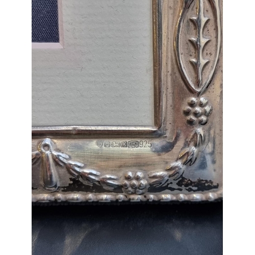 473 - A pair of Edwardian style silver photograph frames, by Ari D Norman, Sheffield 1996/7, 24.5cm high. ... 