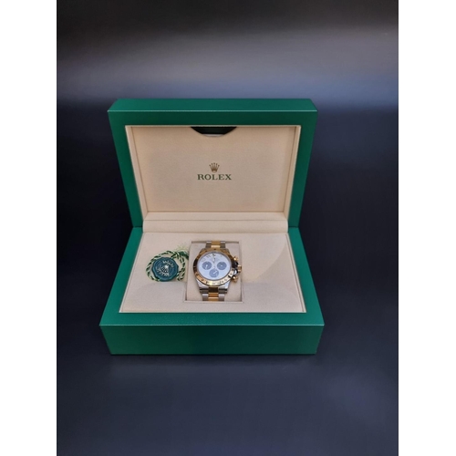 475 - A Rolex 'Panda Dial' Cosmograph Daytona 18k gold and stainless steel wristwatch, Ref. 116523, Serial... 