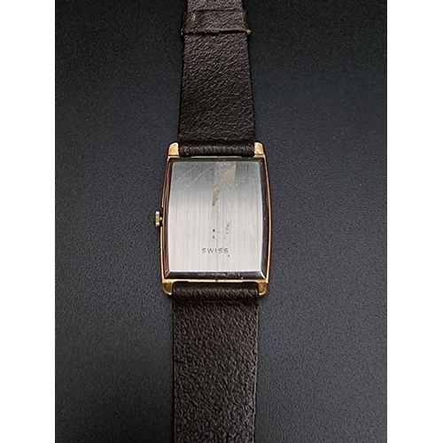 500 - A vintage Rotary gold plated Rotary manual wind wristwatch, 27mm, on brown leather strap, boxed; tog... 