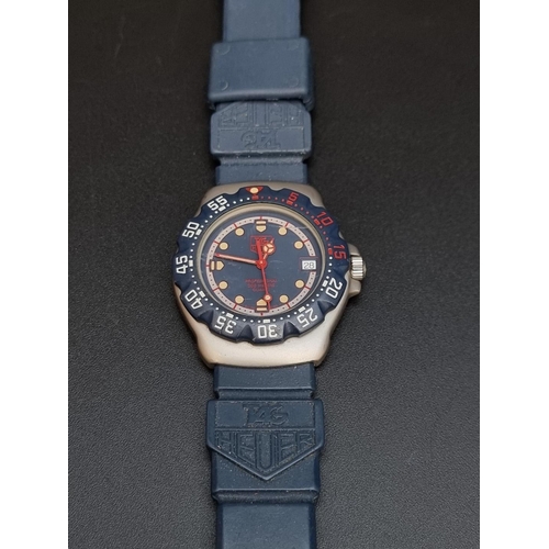 520 - A 1980s TAG Heuer Formula 1 Professional quartz wristwatch, 35mm, Ref. WA1210, on blue silicone... 