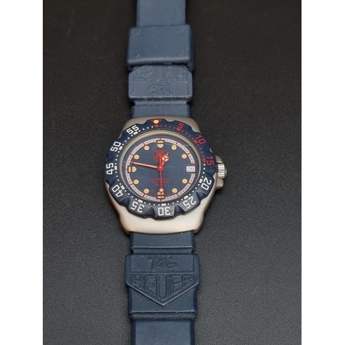 520 - A 1980s TAG Heuer Formula 1 Professional quartz wristwatch, 35mm, Ref. WA1210, on blue silicone... 