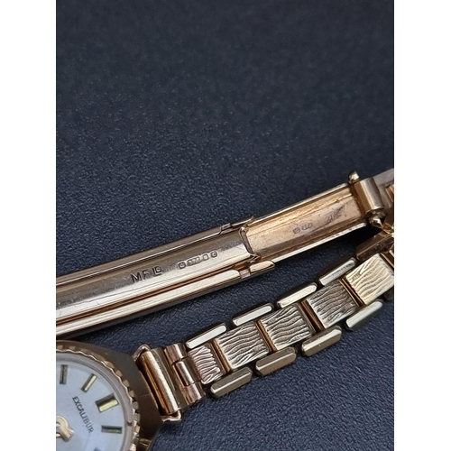 521 - An Excalibur 9ct gold manual wind ladies wristwatch, 15mm.