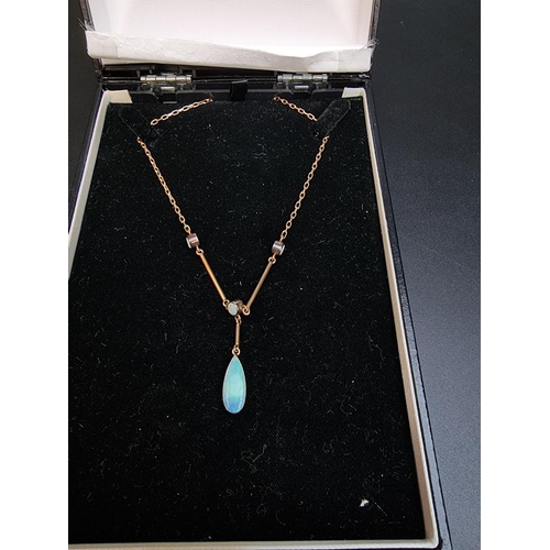 529 - A 9ct gold pendant necklace, set three cabochon opals and teardrop opal, 46cm, gross weight 4.9g.... 