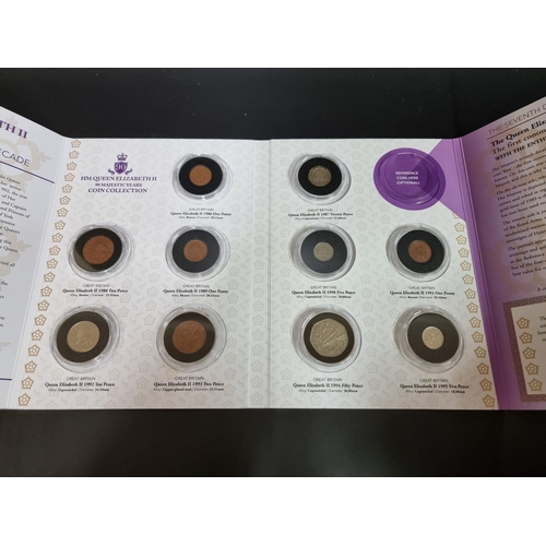 814 - Coins: a boxed London Mint Office 'The HM Queen Elizabeth II 90 Majestic Years' Coin Collection.... 