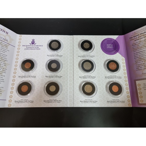 814 - Coins: a boxed London Mint Office 'The HM Queen Elizabeth II 90 Majestic Years' Coin Collection.... 