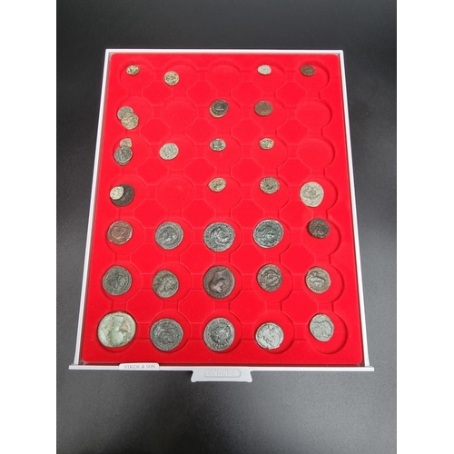 819 - Coins: thirty five Roman coins.