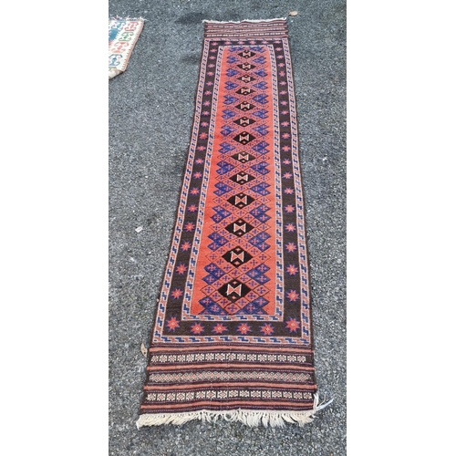 1007 - A Persian runner, having repeated design to central field, with star borders, 285 x 65cm.... 