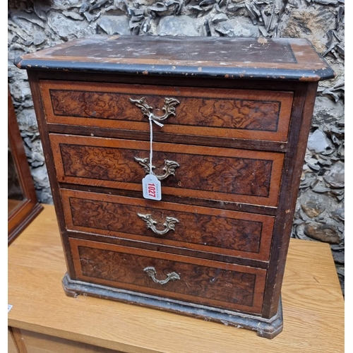1027 - An antique miniature walnut four drawer chest, 44cm high x 41cm wide x 24.5cm deep.