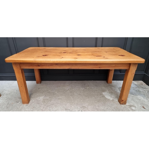 1035 - A pine kitchen table, 182cm long; together with a set of six beech and rush seated ladder back chair... 