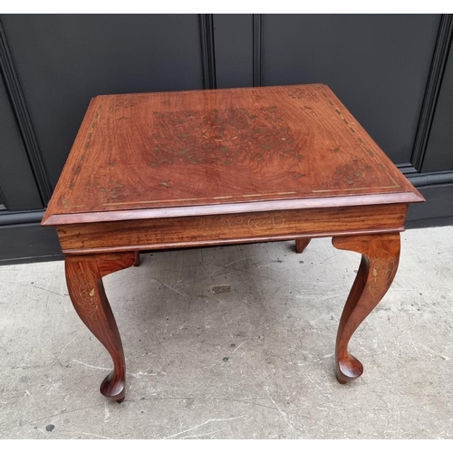 1058 - A hardwood and brass inlaid low occasional table, 58.5cm wide. 