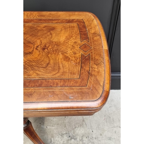 1061 - A Victorian walnut and inlaid card table, with swivel top, 92.5cm wide. 