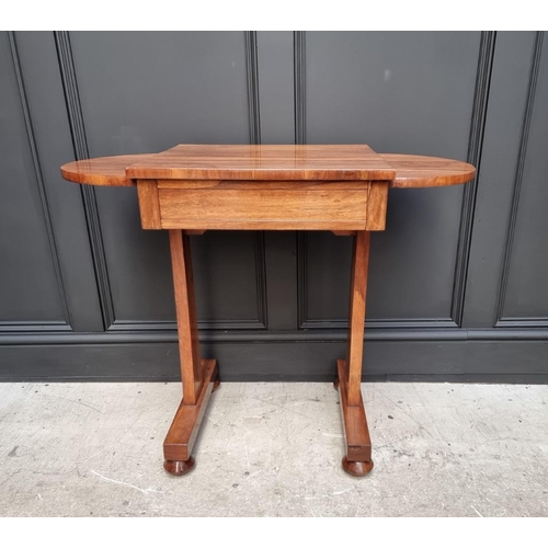 1069 - A Victorian walnut occasional table, with bow ends and frieze drawer, 91cm wide.  ... 