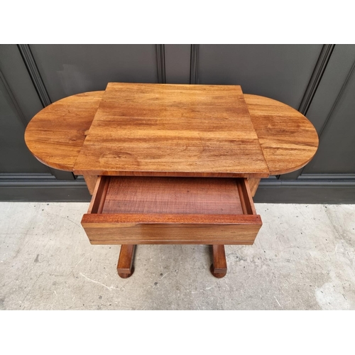 1069 - A Victorian walnut occasional table, with bow ends and frieze drawer, 91cm wide.  ... 