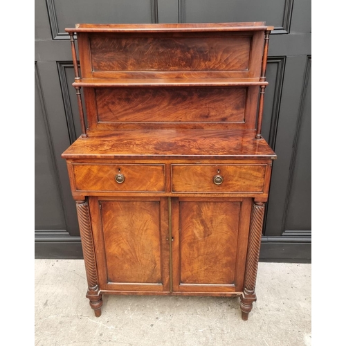 1073 - A George IV figured mahogany chiffonier, in the manner of Gillows, 82.5cm wide. ... 