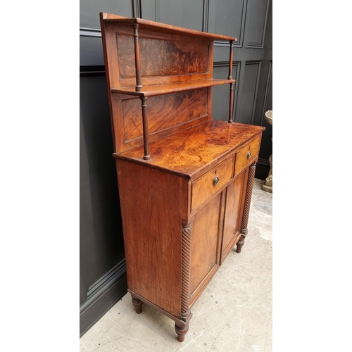 1073 - A George IV figured mahogany chiffonier, in the manner of Gillows, 82.5cm wide. ... 