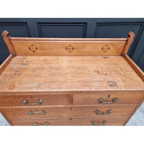 1074 - A good late Victorian, Gothic revival, oak and inlaid chest of drawers, in the manner of John Pollar... 