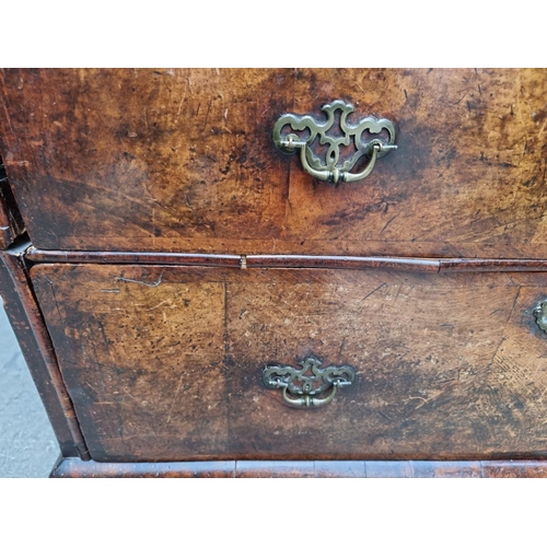 1079 - A George I walnut and crossbanded chest of drawers, 93.5cm wide. 