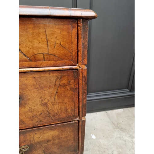 1079 - A George I walnut and crossbanded chest of drawers, 93.5cm wide. 