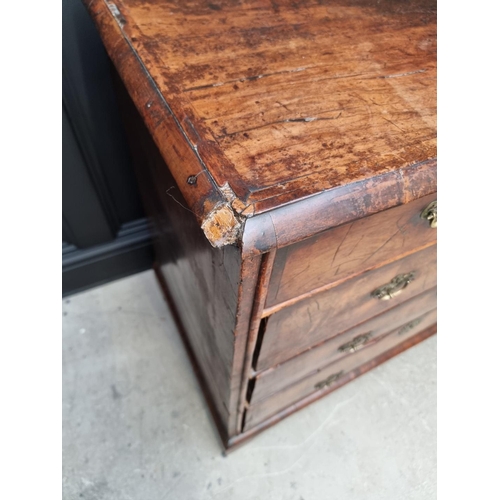 1079 - A George I walnut and crossbanded chest of drawers, 93.5cm wide. 