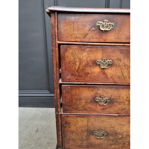 1079 - A George I walnut and crossbanded chest of drawers, 93.5cm wide. 