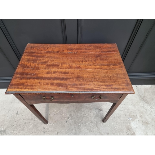 1080 - A George III mahogany side table, 73cm wide.