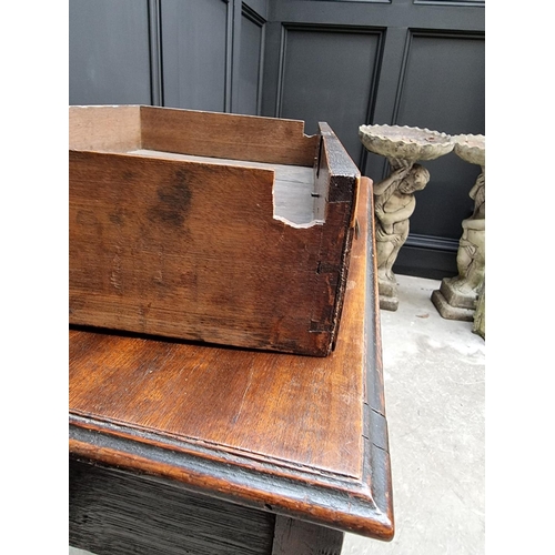 1080 - A George III mahogany side table, 73cm wide.