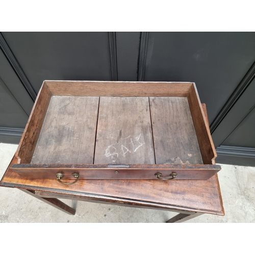 1080 - A George III mahogany side table, 73cm wide.