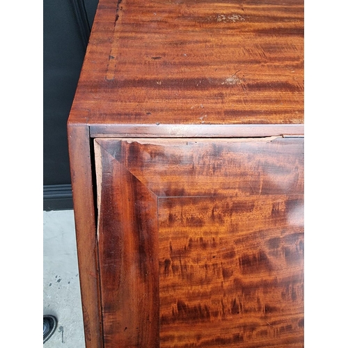 1083 - A George III mahogany bureau, the interior with inlaid drawers, 112cm wide. 